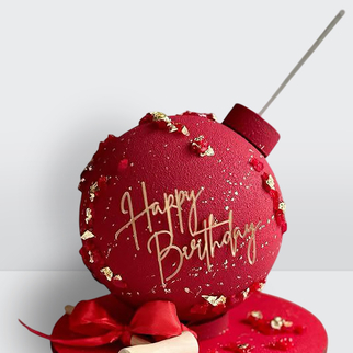 Торт бомба с фитилем красный с золотыми блестками на день рождения