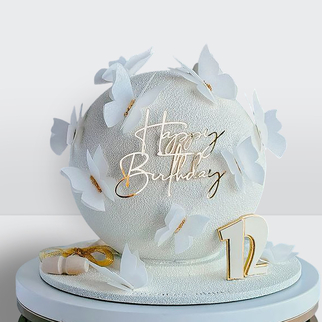 Торт бомба белый с бабочками с фитилем на день рождения