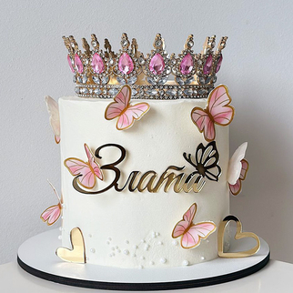 Торт ламбет белый с короной с розовыми бабочками и сердечками