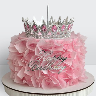 Торт розовый с серебряной короной надписью и бахромой