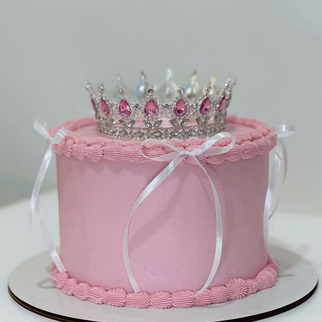 Торт ламбет розовый с короной и белыми лентами