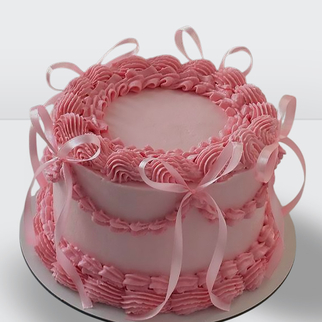 Торт ламбет розовый с розовыми ленточками с нежным декором и гармоничной композицией оформления