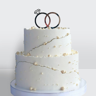 0 Свадебный торт с обручальными кольцами и жемчужинами