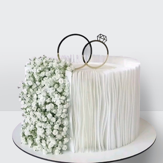 0 Свадебный торт с обручальными кольцами, драпировкой и цветами