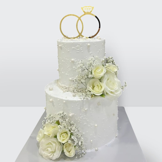 0 Свадебный торт с обручальными кольцами, жемчужинами и цветами