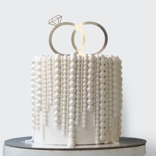 0 Свадебный торт с обручальными кольцами и нитями из жемчуга