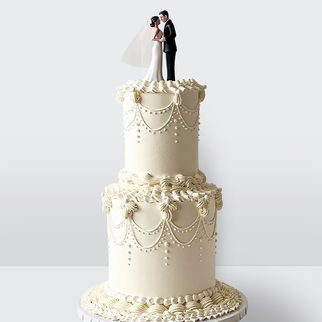 0 Свадебный торт с фигурками жениха и невесты 2 яруса ламбет с изящным декором и классической композицией