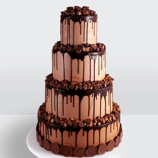 0 Торт шоколадный 4 яруса с конфетами и орео