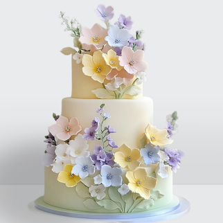 0 Торт 3 яруса с градиентом радугой, с разноцветными цветами