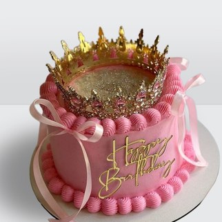 Торт розовый ламбет с короной и блестками с изящным декором и праздничной композицией