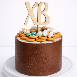 Торт - кулич пасхальный ХВ в шоколадной глазури с крашеными яичками